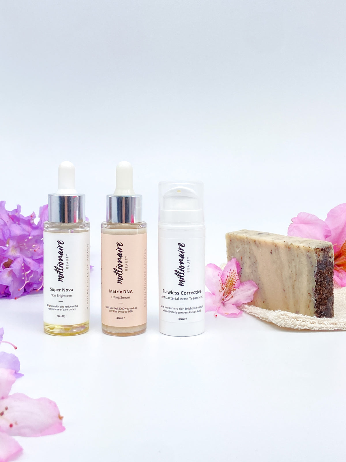Millionaire Healed &amp; Nourished Skin Bundle - Matrix DNA, Super Nova, Flawless Corrective, Cleansing Bar &amp; Soap Pouch