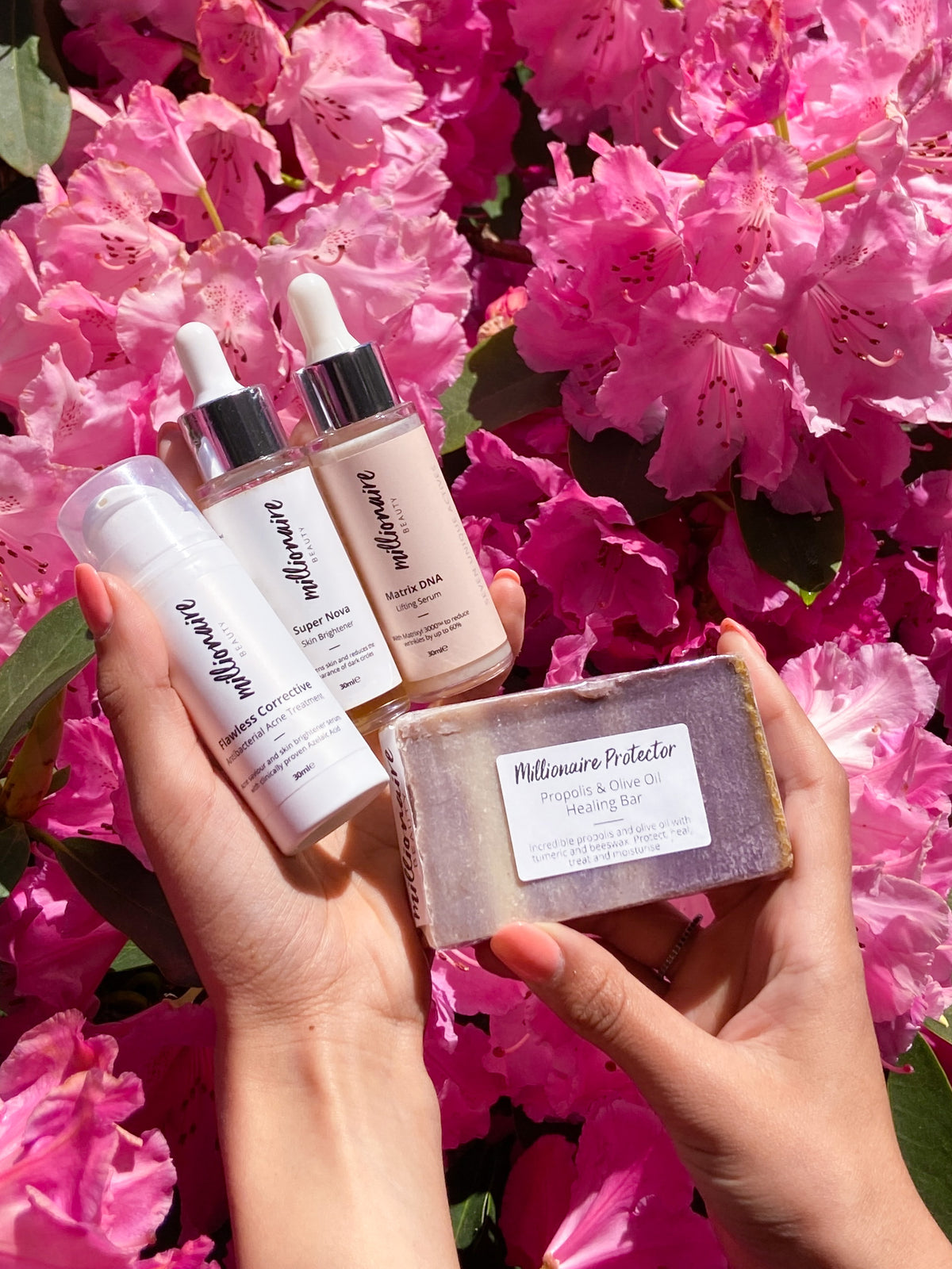 Millionaire Healed &amp; Nourished Skin Bundle - Matrix DNA, Super Nova, Flawless Corrective, Cleansing Bar &amp; Soap Pouch