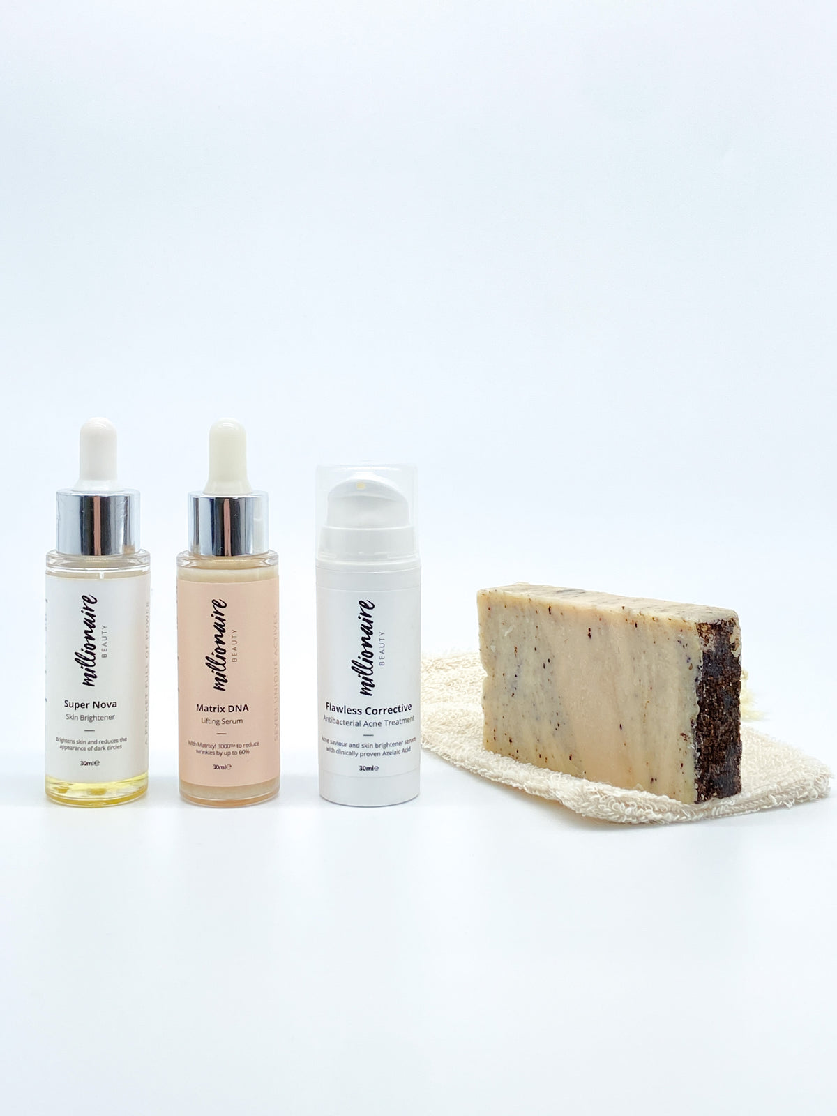 Millionaire Healed &amp; Nourished Skin Bundle - Matrix DNA, Super Nova, Flawless Corrective, Cleansing Bar &amp; Soap Pouch