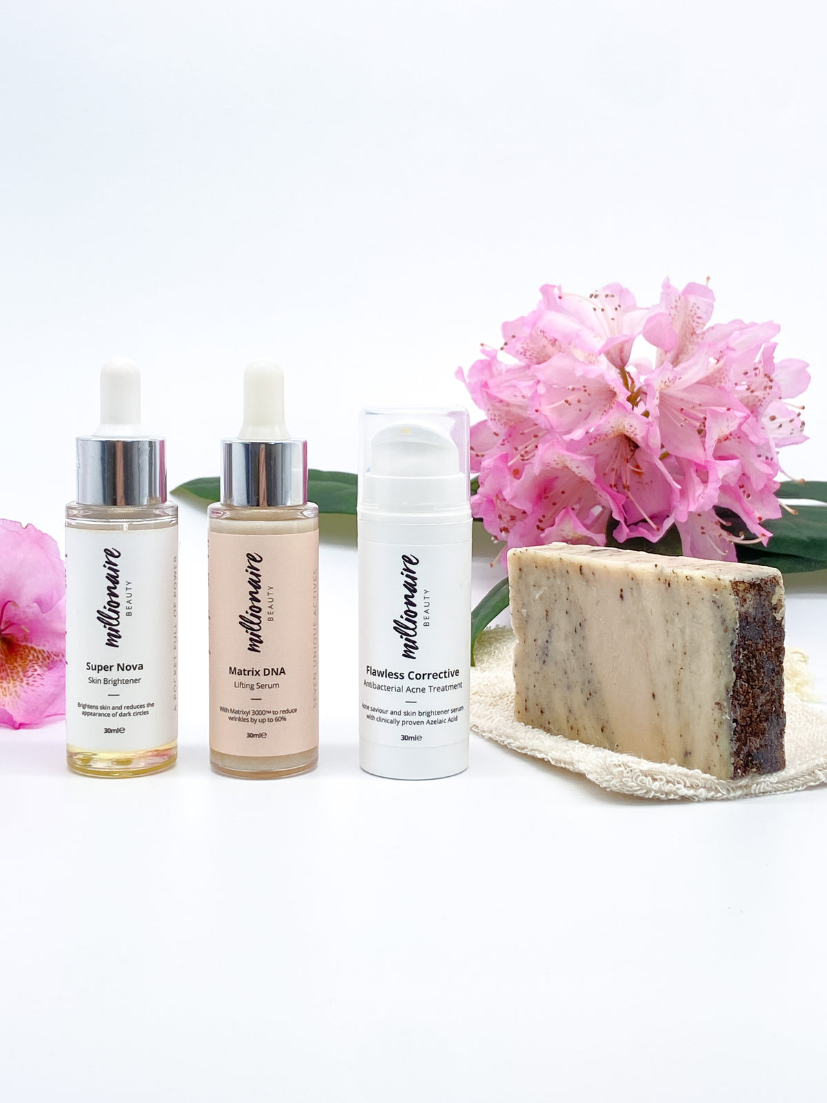 Millionaire Healed &amp; Nourished Skin Bundle - Matrix DNA, Super Nova, Flawless Corrective, Cleansing Bar &amp; Soap Pouch